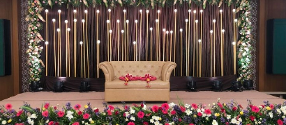 Engagement decoration showcasing floral designs and delicate drapes, perfect for a memorable occasion.